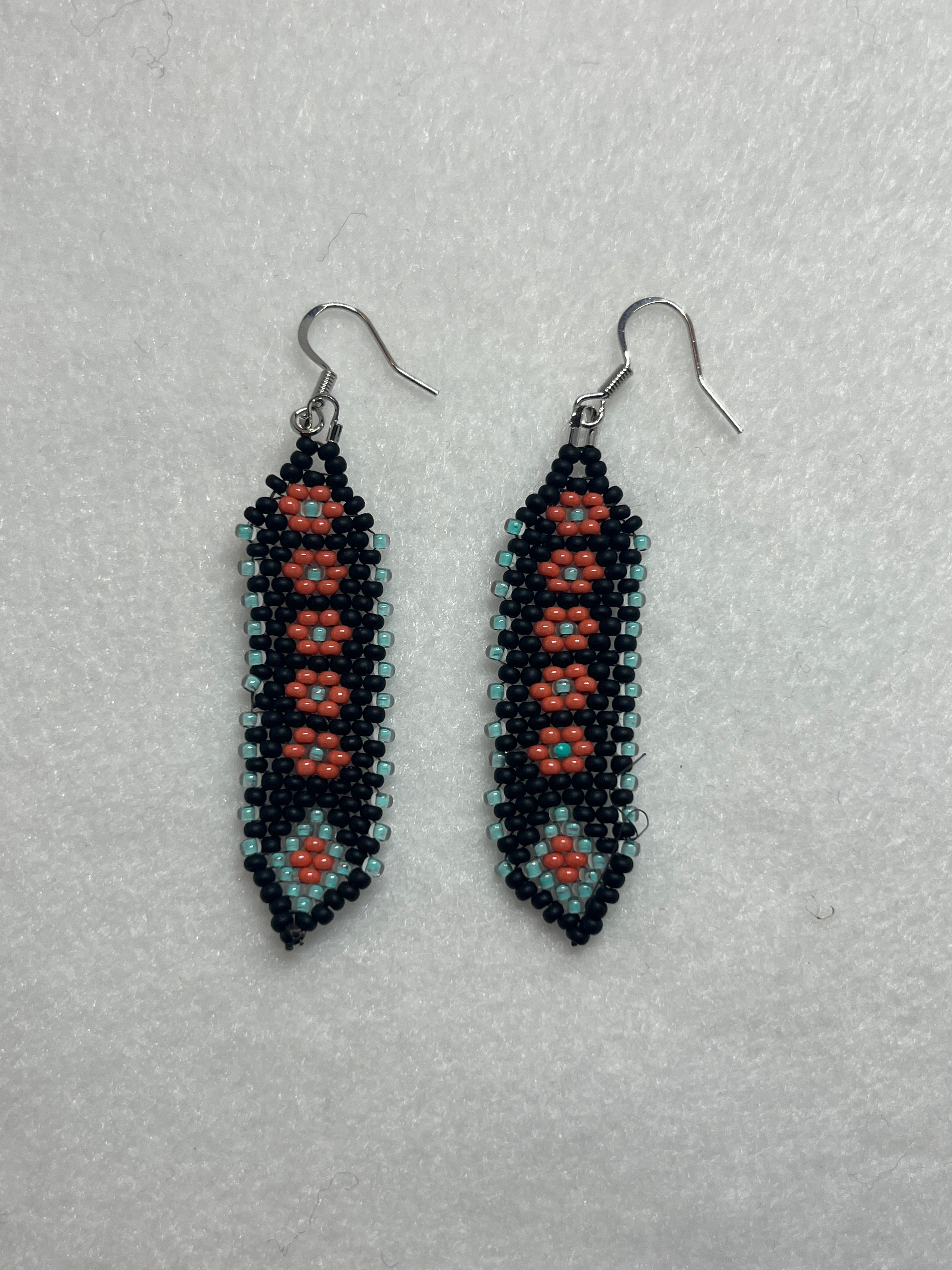 Brandon Swain Novlesky Black Feather Earring with Coral Flower