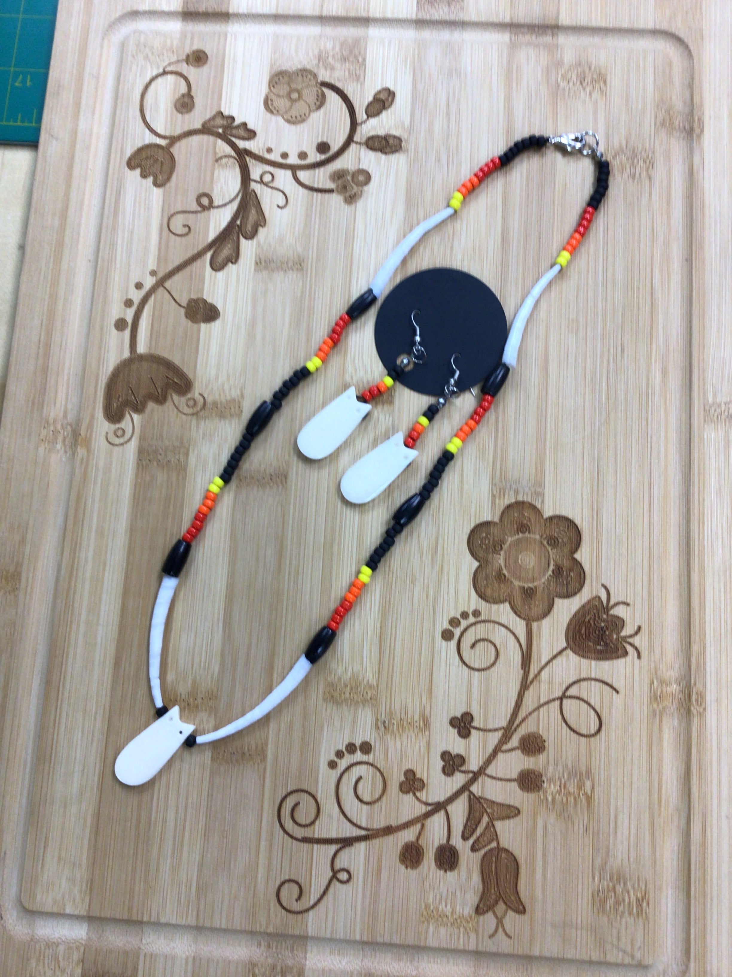 Mikey Runningbird Black Elk Teeth Set